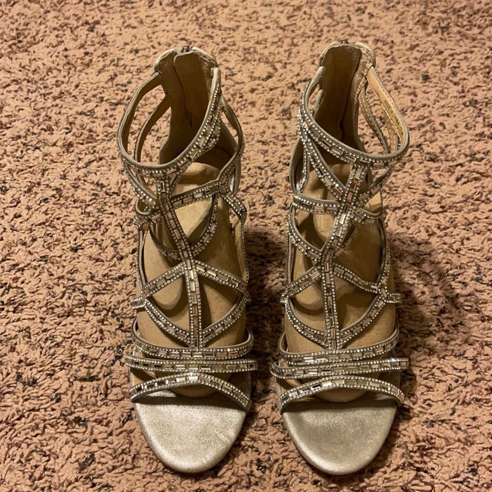 Silver stud Antonio Melani Heels only worn once. Size 7.5 M.